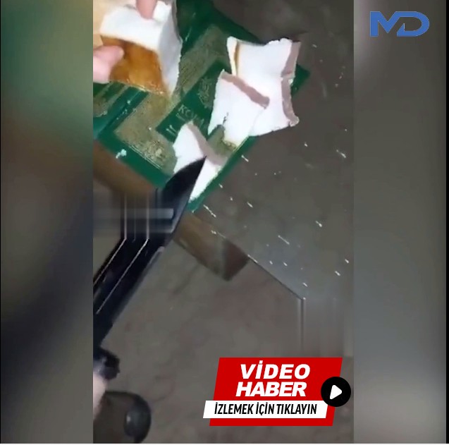 Ukrayna askerleri, Kur'an-ı Kerim üstünde domuz yağı kesti